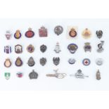 A quantity of military and Home Front lapel badges, sweetheart brooches, etc