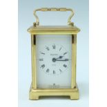 A late 20th Century brass carriage clock, keyless wind and set, movement marked 'Douvrdrey and