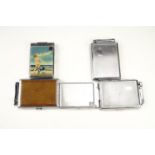 Two vintage Colbrini "Monopol" combination cigarette case and lighters, together with another