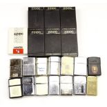 A quantity of vintage Zippo and Ronson flip-top petrol lighters, including seven cased Zippos