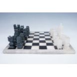 A modern marble and onyx chess set, board 35.5 cm square