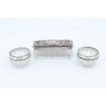 An early 20th Century silver-lidded cut glass dressing table pins box, together with a pair of