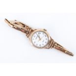 A lady's 9 ct gold wristwatch, having a Sekonda quartz movement, 9 ct gold expanding bracelet,