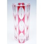 A French Saint-Louis studio glass vase, of perpendicular form, ruby flashed and cut with broad