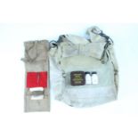 A Second World War General Service respirator haversack together with a "housewife" sewing kit and a