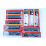 Ten boxed Hornby model railway carriages (as-new)