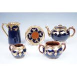 An Albany and Harvey five piece teaset in gilt cobalt blue