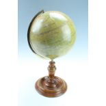 A Philip's Educational Terrestrial Globe, 9-inch, on turned mahogany stand, 42 cm