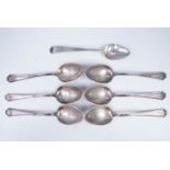 A set of six early 20th Century white metal teaspoons, having monogrammed terminals and tested as