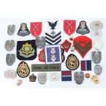 Sundry items of post-War world military insignia and reproduction badges