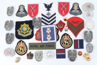 Sundry items of post-War world military insignia and reproduction badges