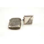 A diminutive white metal fob vesta case, having an embossed golfer in full swing to front and