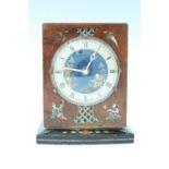 A 1950s Chinoiserie walnut mantle clock, having a Smiths movement, a painted and gilt dial