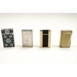 Four S J Dupont roller gas lighters