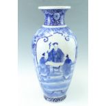A large late 20th Century Chinese blue and white vase, of ovoid shape with a narrow neck and