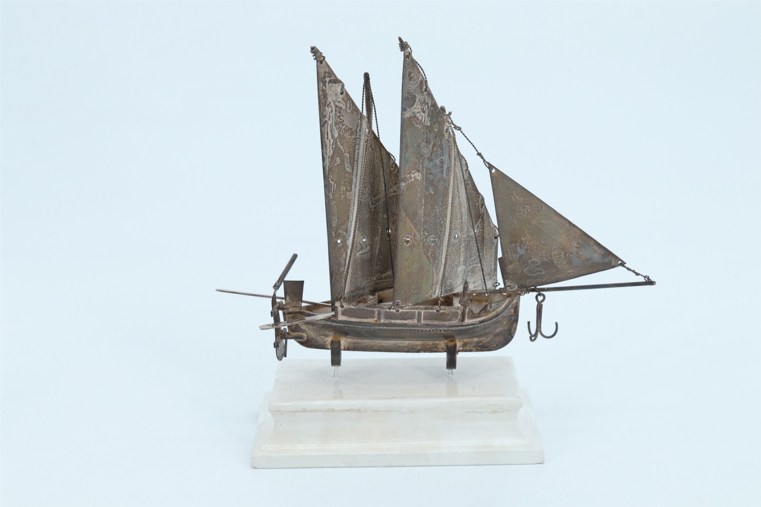 Two silver models of Maltese speronara two masted boats, respectively standing on a white painted - Image 2 of 4
