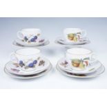Four Royal Worcester "Evesham" cups, saucers and tea plates