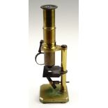 A Victorian student's brass microscope, 24 cm