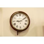 An early 20th Century mahogany cased wall clock, the printed white dial bearing 'G SALT', 31 cm