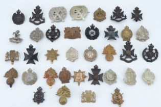 A large collection of London regiment and related badges