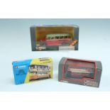 Three boxed Corgi die-cast busses