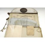 A folder containing "The Cosmopolitan Improved System of Dress Cutting" with instructions etc, dated