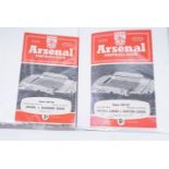 A folder containing largely 1950s football matchday programmes, including Arsenal, Chelsea,