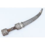 A fine late 19th / early 20th Century Middle Eastern jambiya dagger, the hilt bound in finely