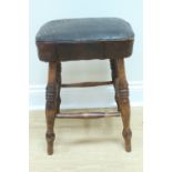 A Victorian style high stool, having an overstuffed upholstered seat, 50 cm