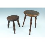 A small turned and poker-worked mahogany milking type stool, together with one other similar example