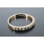 A diamond half hoop eternity ring, the brilliants set on 9 ct gold, O/P, 1.3 g