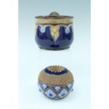 An early 20th Century Royal Doulton Lambeth stoneware matchpot and tobacco jar, 12 cm x 10 cm