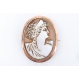 A vintage shell cameo brooch, the oval cameo depicting a classical female bust, mounted on 9 ct
