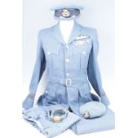 A post-War RAF officer pilot's tunic, cap, beret and dress waist belt