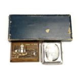 A cased "Memory of Japan" engraved cigarette case and lighter set, together with a Greek mother of