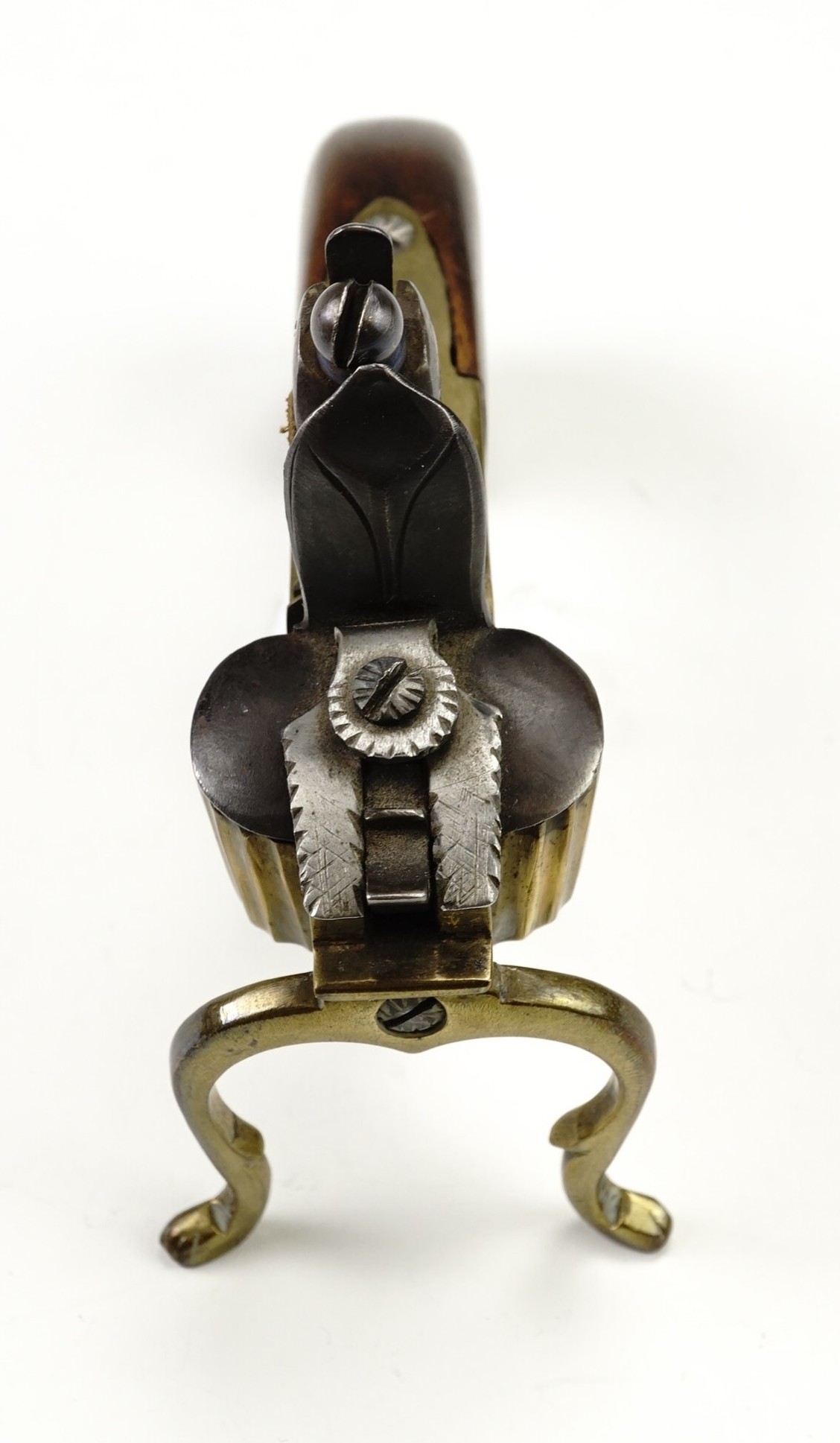 A flintlock tinder box candle lighter, having a brass body with steel cock and frizen on a walnut - Image 2 of 7