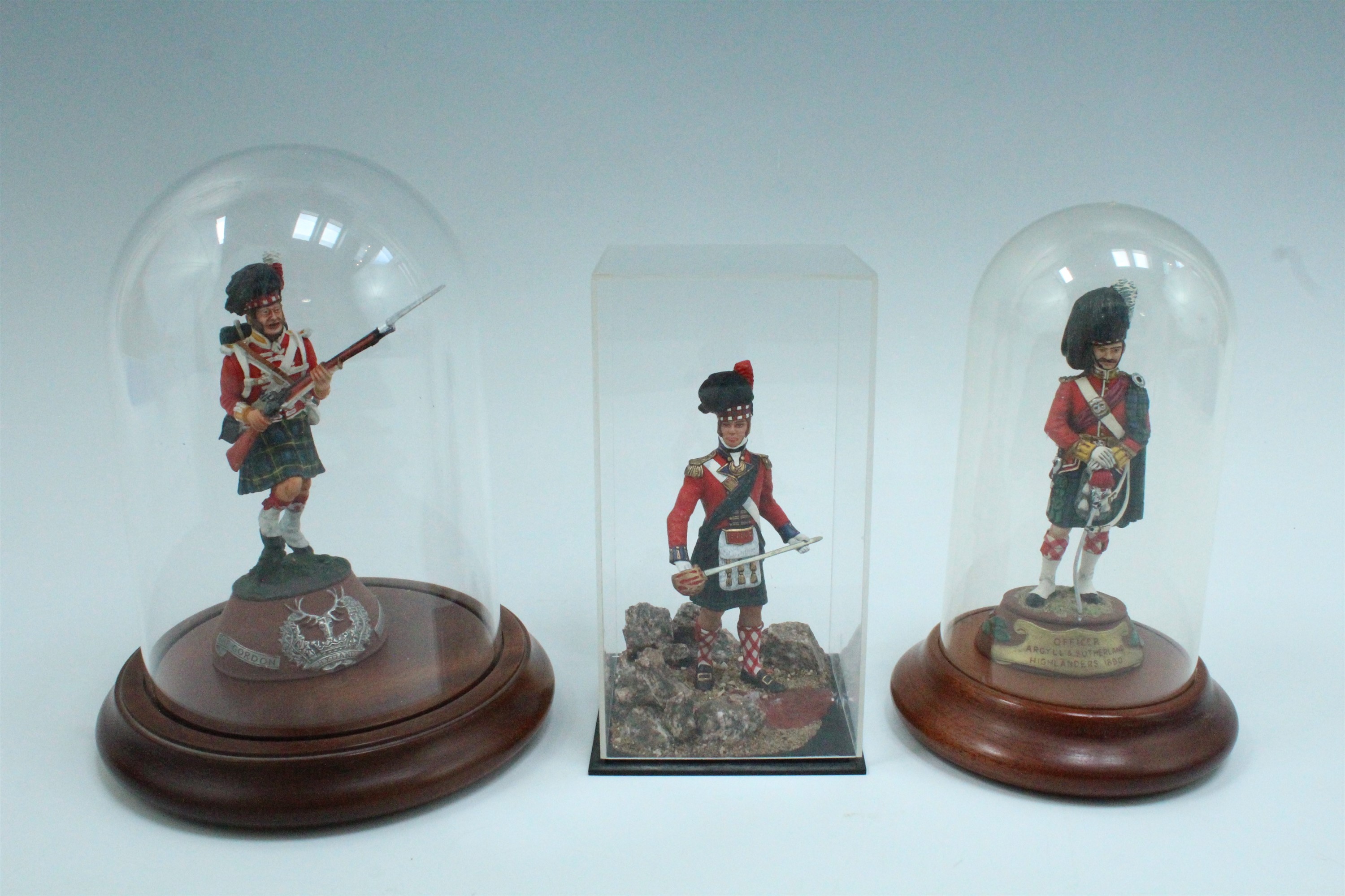 Three painted die-cast lead figures of 19th Century Highland soldiers, one in display case, together - Image 2 of 2