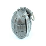 An inert Second World War British No 36 Mills grenade, complete, the base plug dated 1940