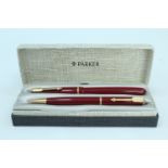 A 1970s Parker fountain pen and propelling pencil set, having squeeze fill, in its box with outer