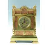 An imposing Victorian brass mantle clock, having a French drum movement striking on a gong, the