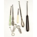Eight various early 20th Century and later button hooks, including two silver handled, longest 25