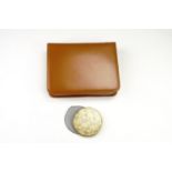 A mid 20th Century Connoisseur cow hide travel grooming kit, together with a powder compact