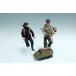 A play-worn Dinky Shado 2, together with an Action Man figure and another similar