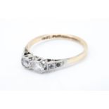 A vintage white sapphire ring, comprising a pair of brilliant-cut stones each of approx 0.1 ct,