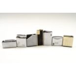 A small group of vintage Colibri cigarette lighters