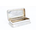 A George VI silver snuff box, being engine turned with cast borders and having an engraved