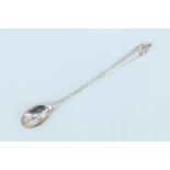 A 19th Century Hanoverian pattern white metal long handled spoon, having a finial terminal and a