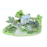 A model woodcutters caravan, 28 cm x 25 cm x 12 cm