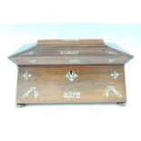 A Victorian mother-of-pearl inlaid rosewood sarcophagus form tea caddy, 33 cm x 19 cm x 18 cm