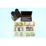 A Victorian Brewster-type stereoscope, together with a quantity of cased slides including the